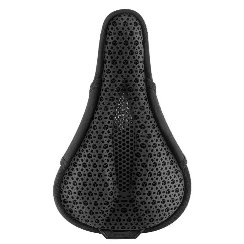 Black bicycle seat with a pattern on a white background