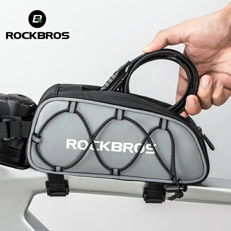 RockBros bike frame bag held by a hand with a white background