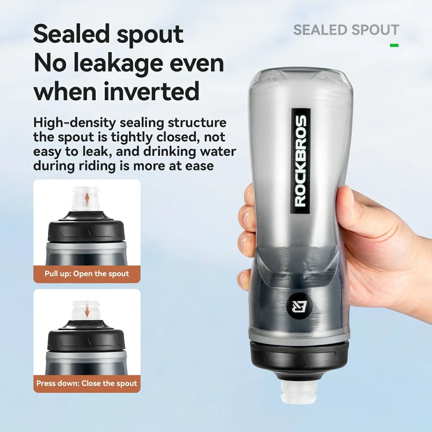 Silver water bottle with sealed spout feature, held by a hand, on a light blue background.