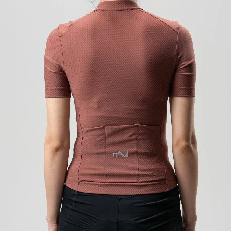 Brown athletic shirt with a brand logo on a gray background  #Color_Red
