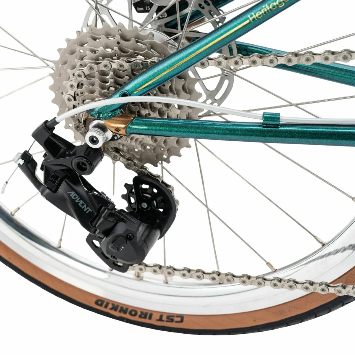 Close-up of a bicycle's gear system with a white background #Color_Green