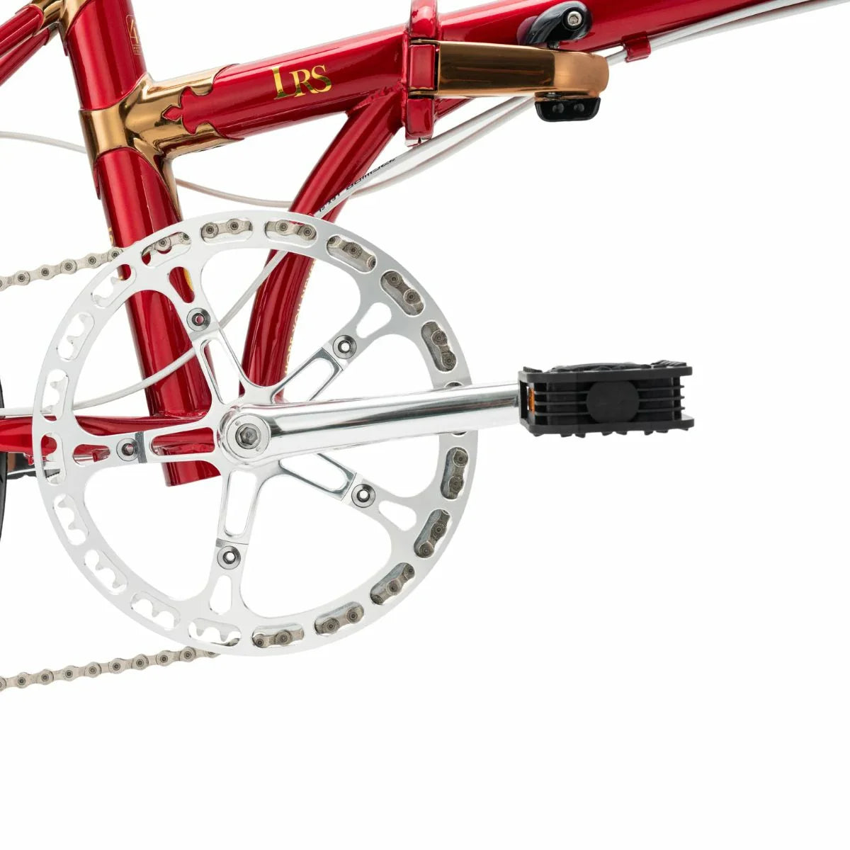 Close-up of a red bicycle with a chain and gear system on a white background #Color_Red