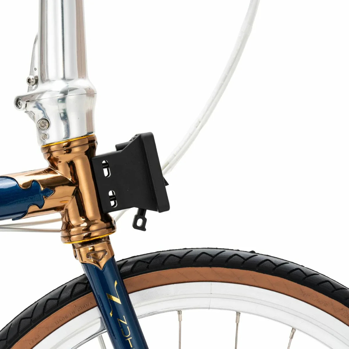 Close-up of a bicycle's head tube with gold and blue finish on a white background #Color_Blue