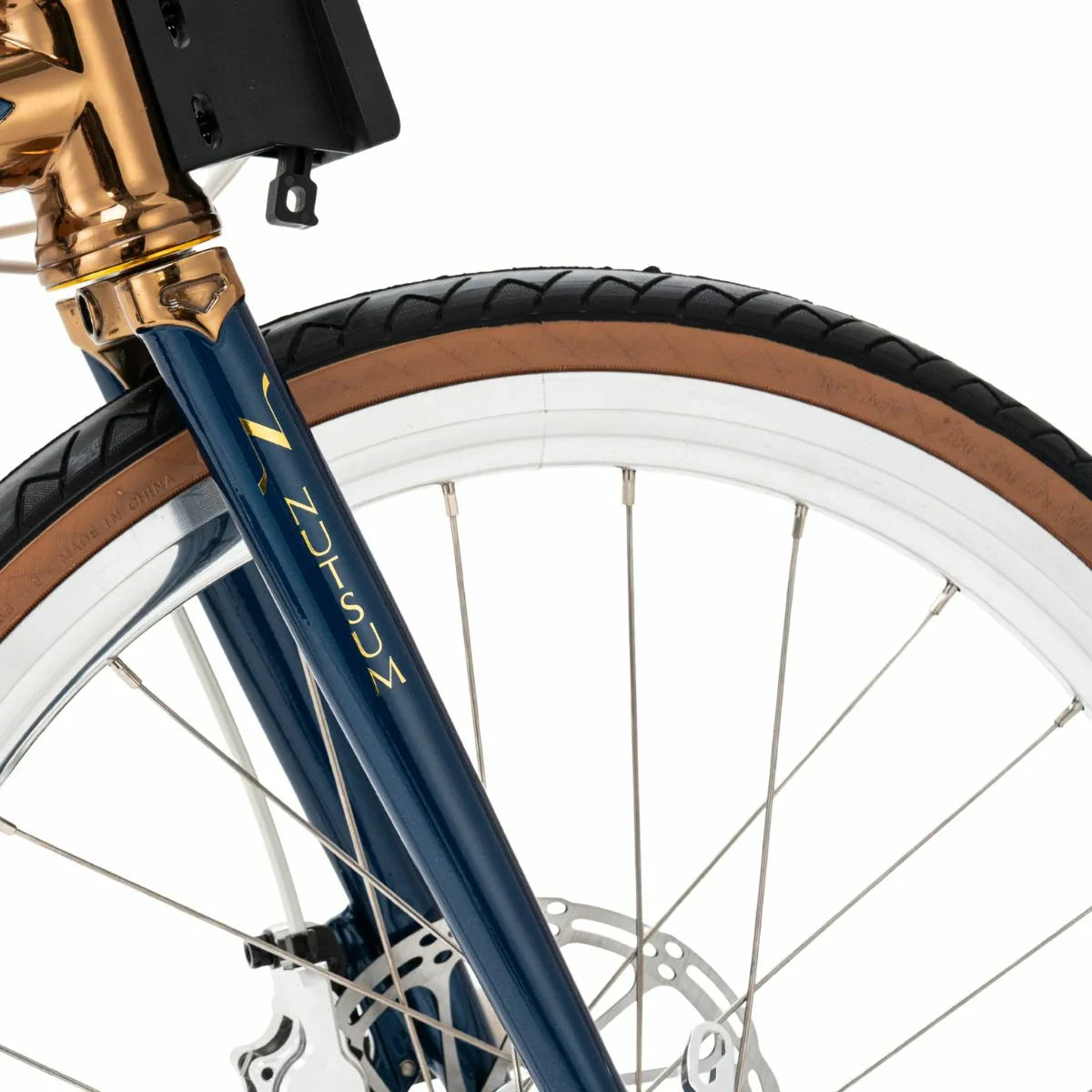 Close-up of a bicycle wheel with a blue frame and gold accents on a white background #Color_Blue