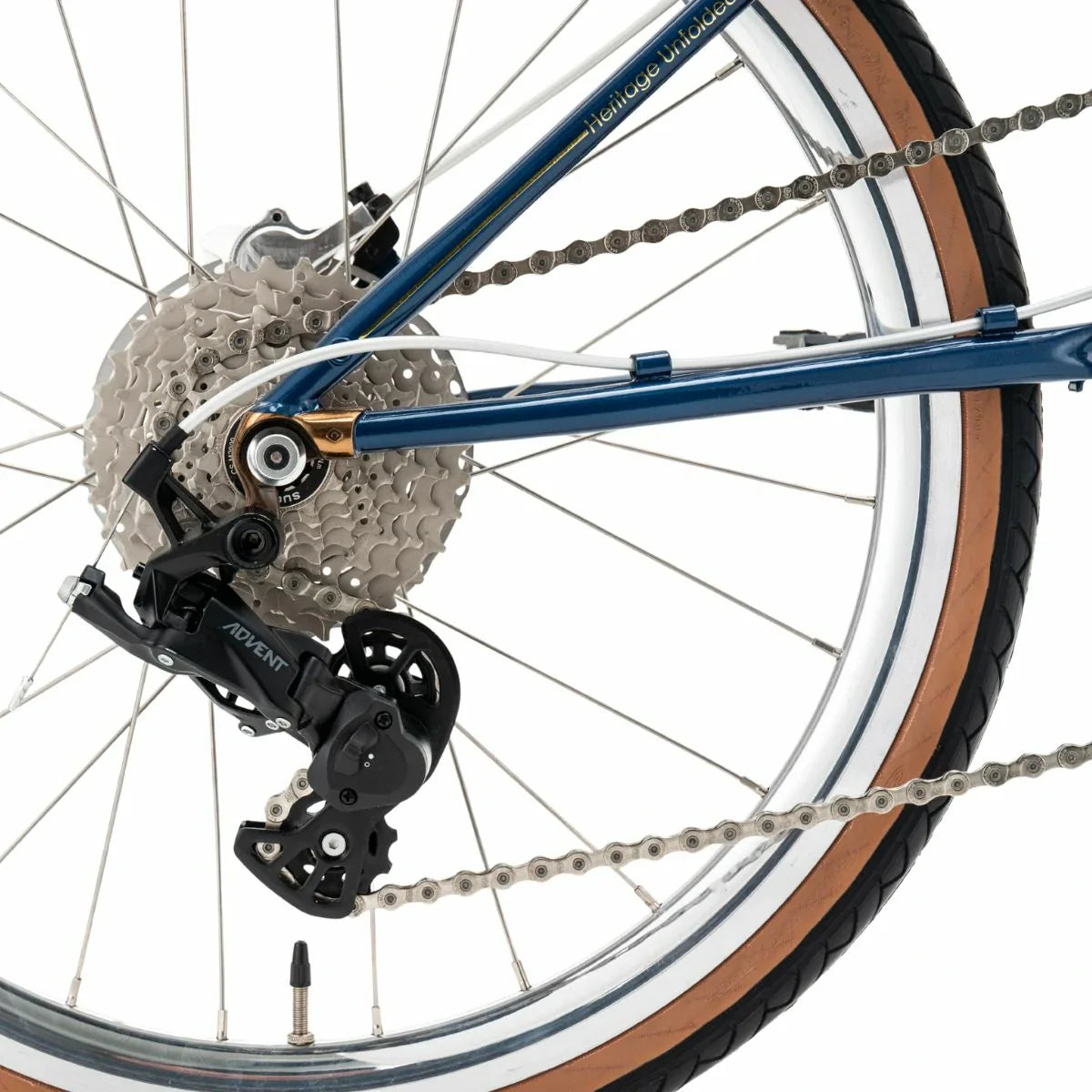 Close-up of a bicycle wheel with chain and gear system on a white background #Color_Blue