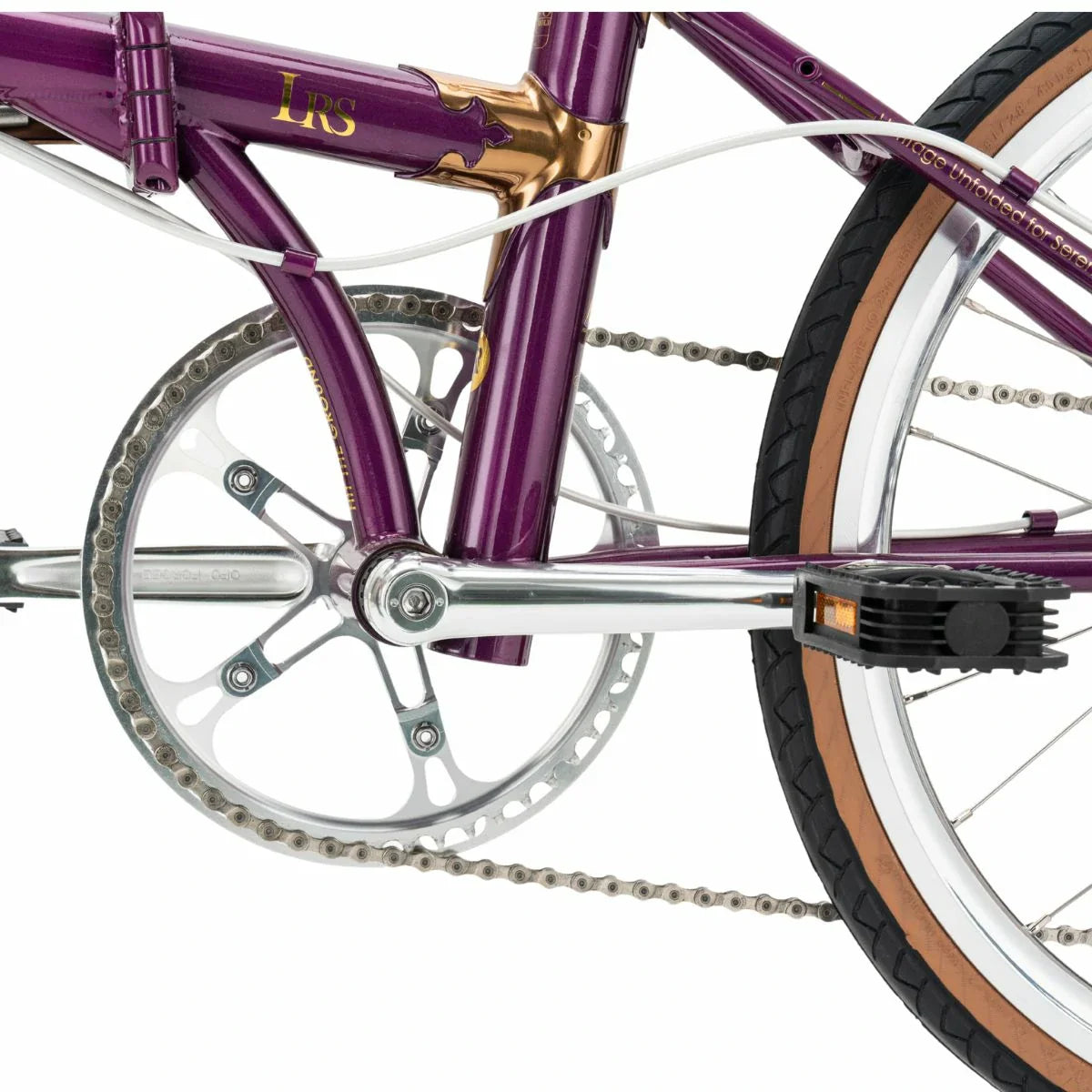 Close-up of a purple bicycle with chain and gear details on a white background #Color_Purple