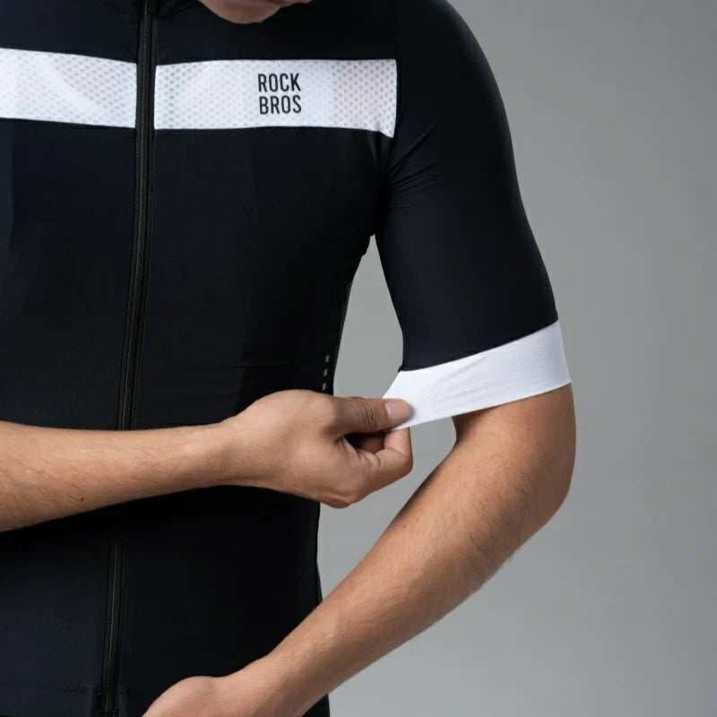 Black cycling jersey with white accents and 'Rock Bros' branding on a gray background