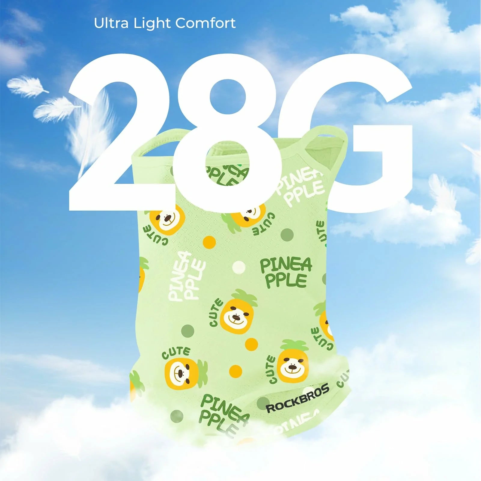 Green mask with pineapple pattern against a blue sky background, featuring the text 'Ultra Light Comfort' and '28G'.