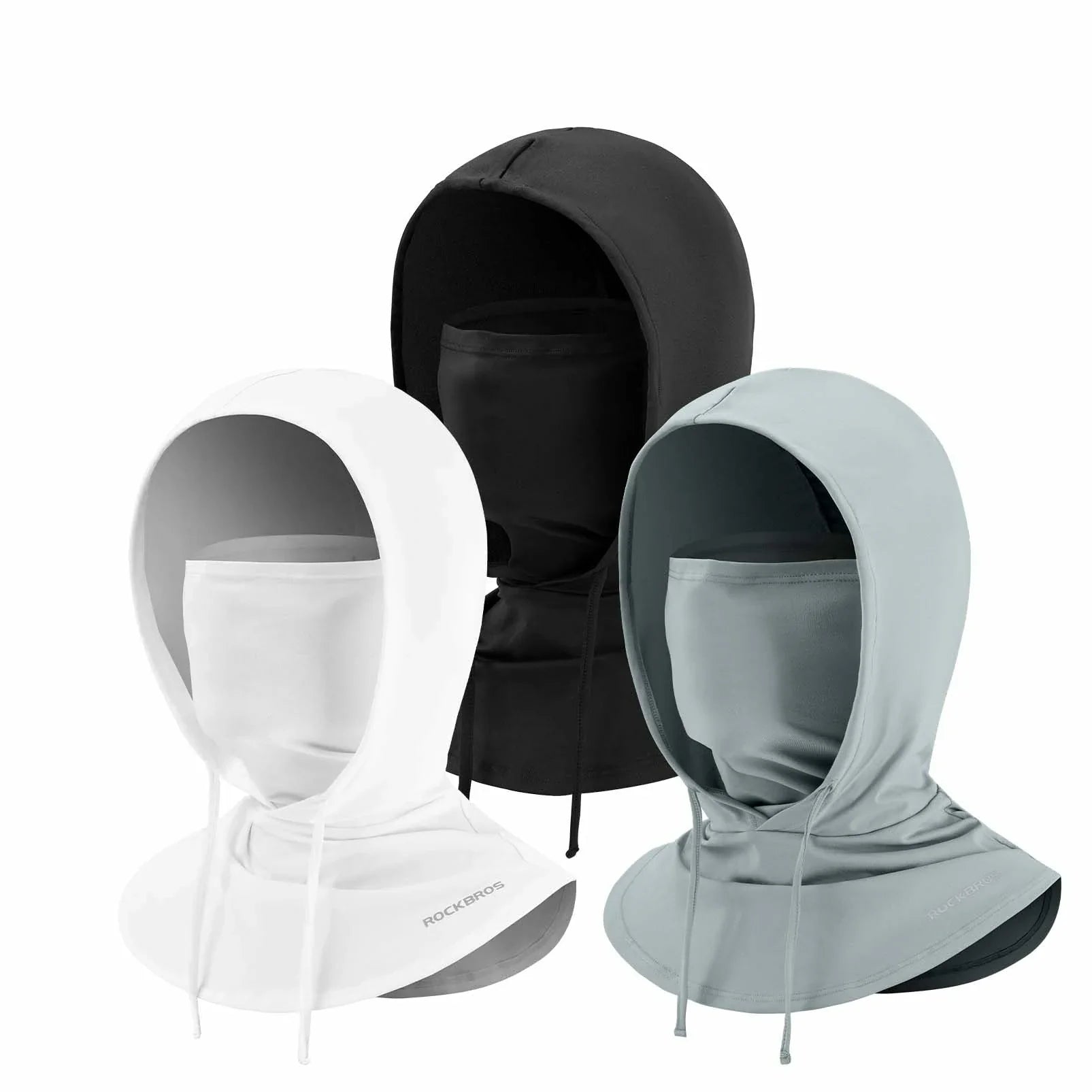 Three masks,black, white, and gray on mannequins against a white background.  #Color_Gray+Black+White