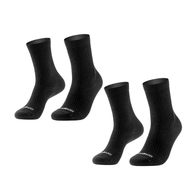 Two pairs of black socks on a white background #Color_Black*2