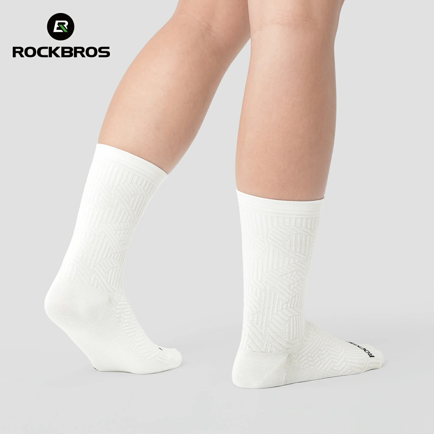 White socks worn by a person on a gray background with RockBros logo.