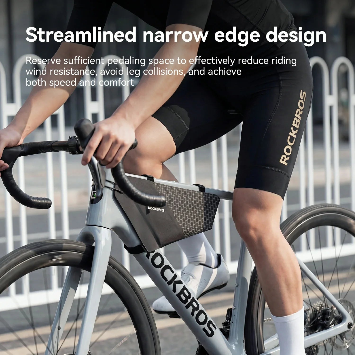 Person riding a bicycle with a ROCKBROS bag, wearing black cycling shorts with the brand name.