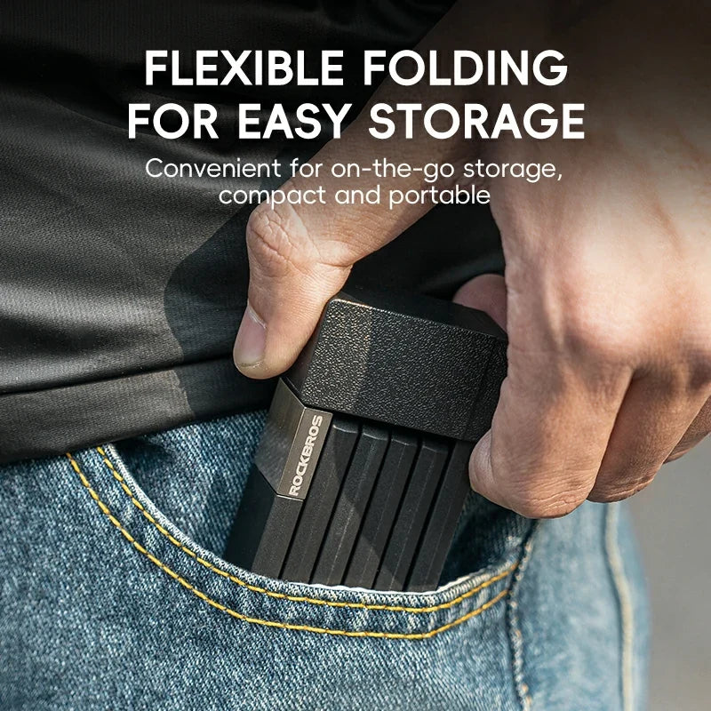 Person inserting a black lock into their jeans pocket with text about flexible folding for easy storage.