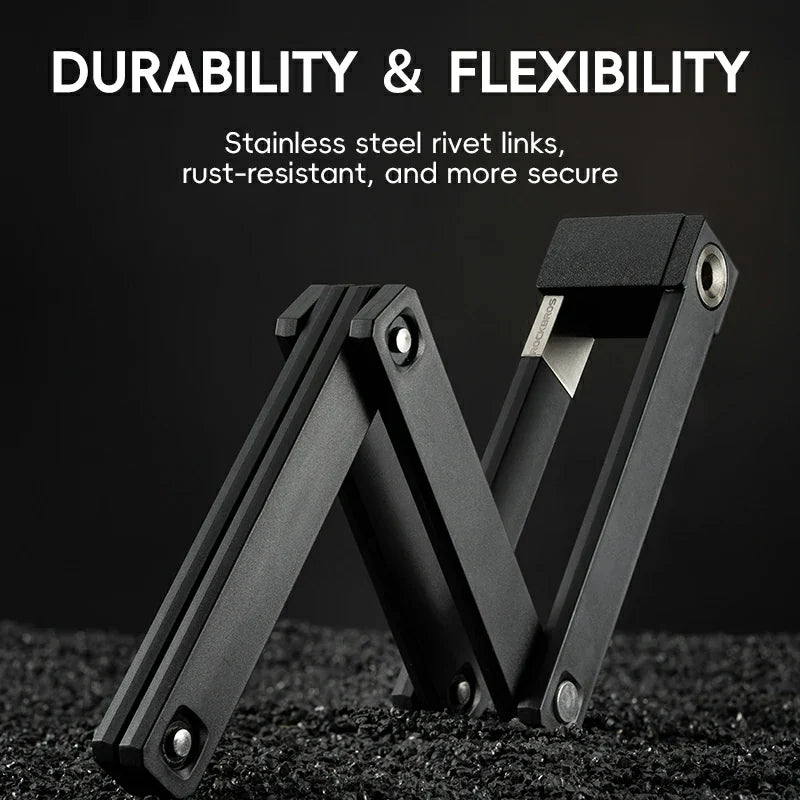 Black metal folding tool with text about durability and flexibility on a dark background