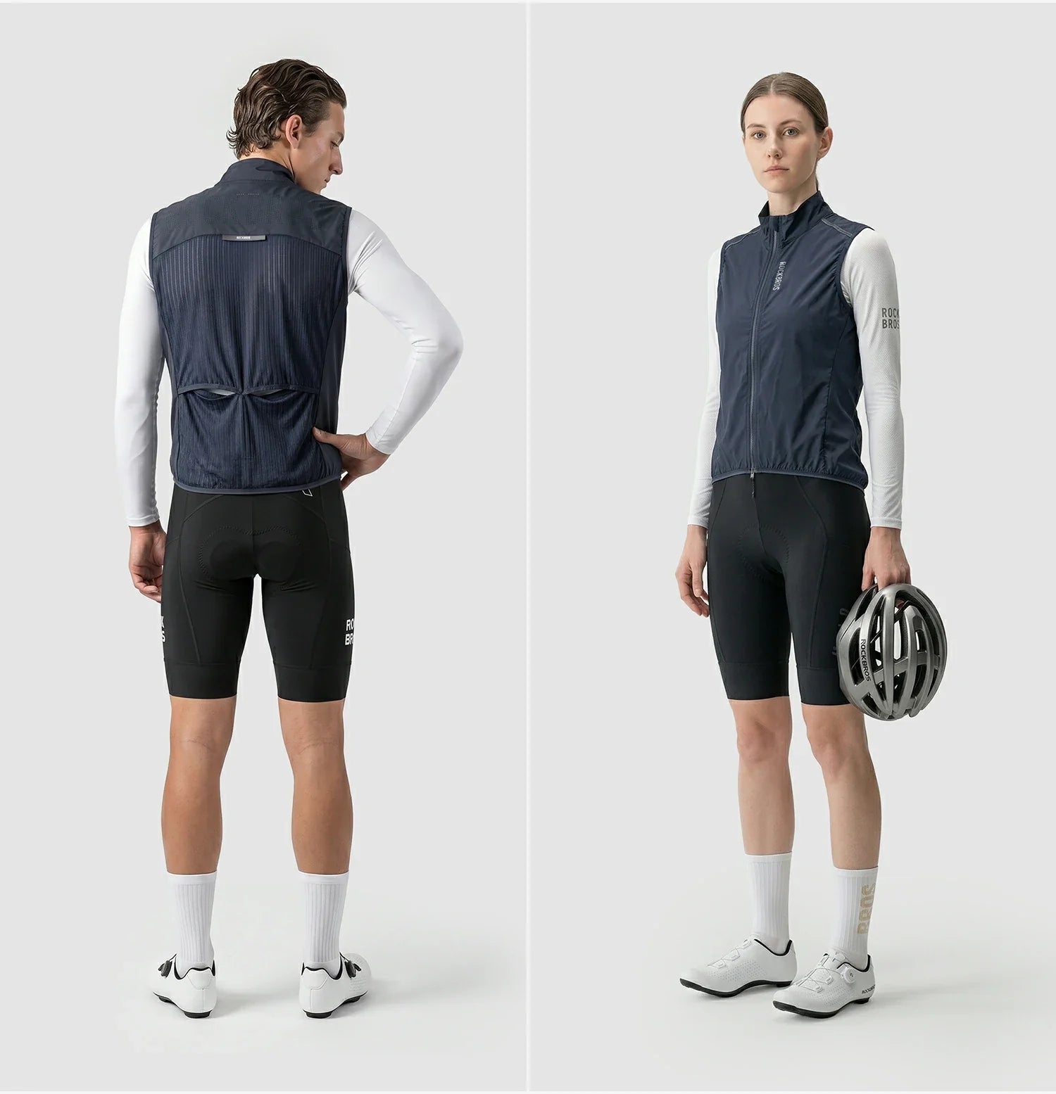 Person wearing a cycling outfit with a helmet on a white background