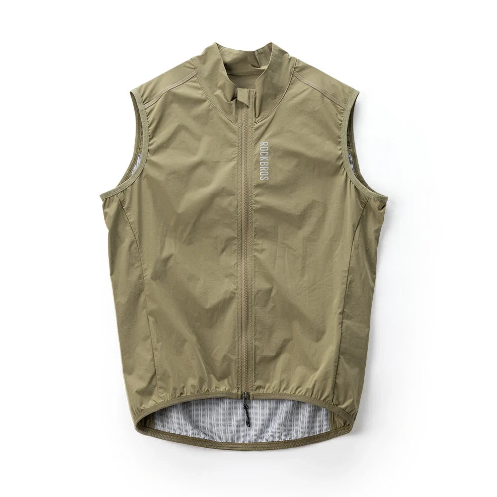 showing the side profile and fit of a green sleeveless cycling jacket #color_khaki