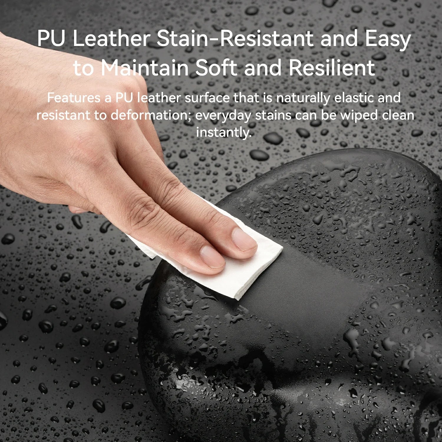 Hand cleaning a black surface with a cloth, text about PU leather stain-resistance.
