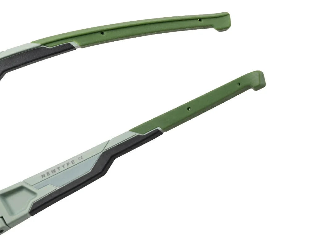 Two green car wiper blades on a white background
