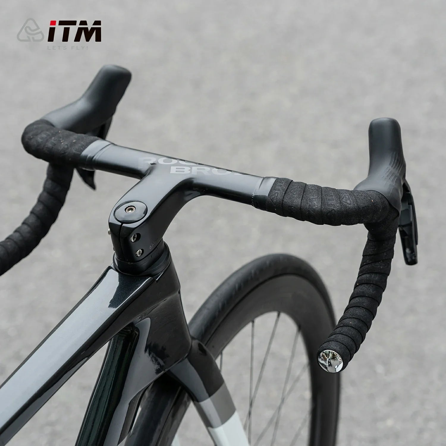 Black handlebar tape with a thick center and tapered edge construction.