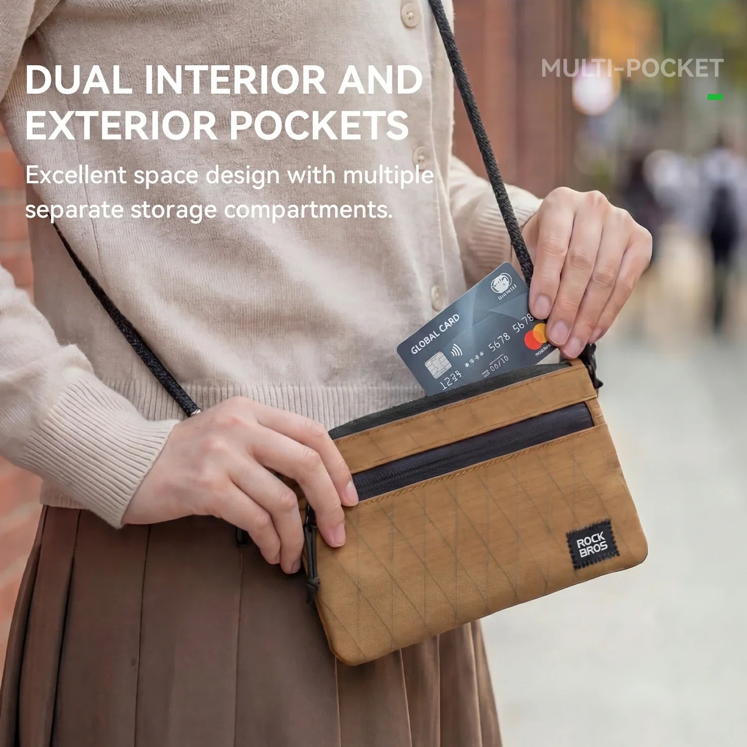 Person holding a brown crossbody bag with text highlighting its features.