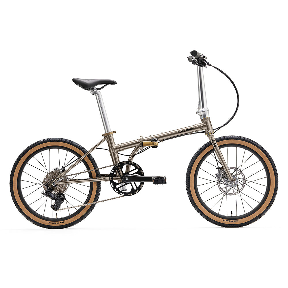 Foldable bicycle with brown tires on a white background #Color_Titanium