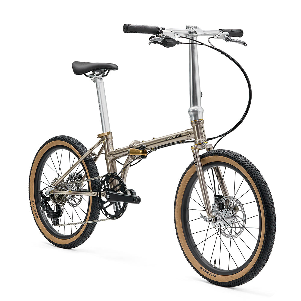 Foldable bicycle with brown tires on a white background #Color_Titanium