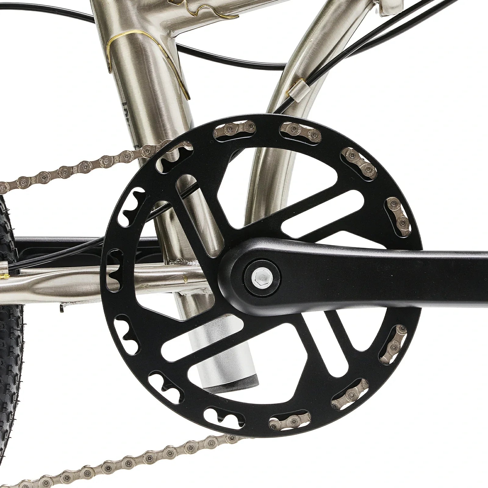 Close-up of a bicycle chainring and chain on a white background 
