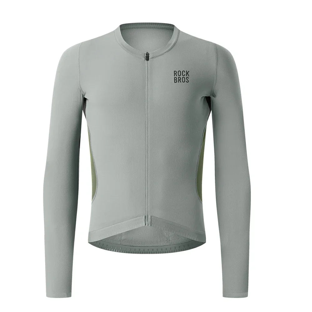 A light gray long-sleeve cycling jersey with a full front zipper, a crew neck, and the 'ROCKBROS' logo printed in black on the left chest. The jersey is shown on a clean white background.  #Color_Gray