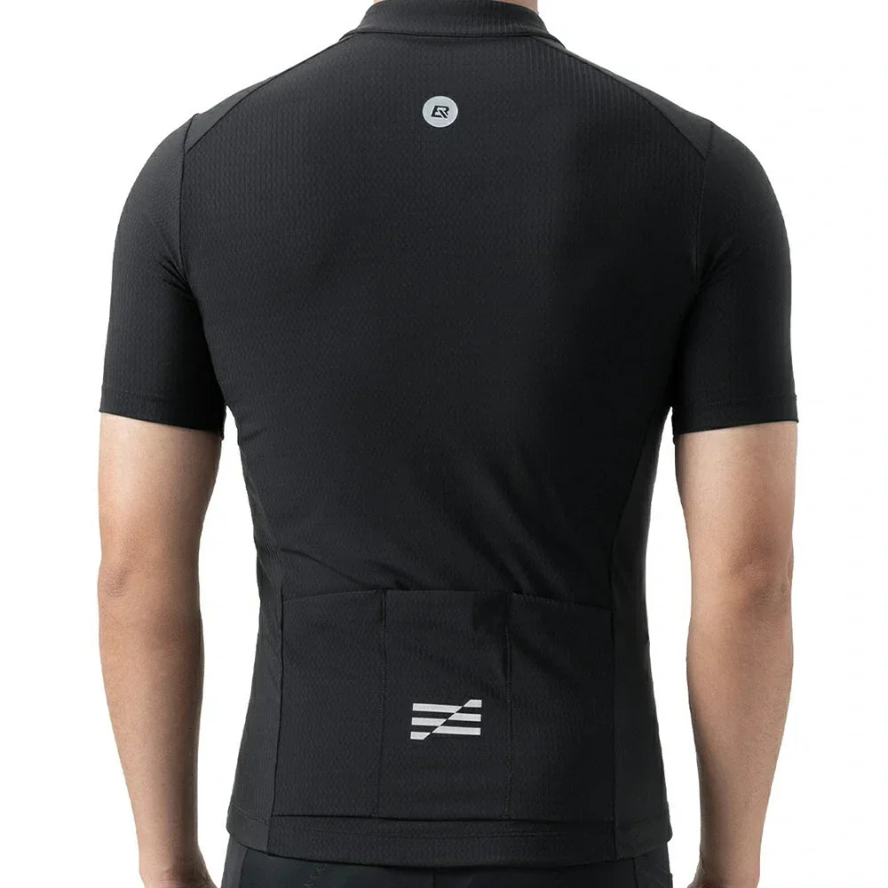 Rear view of a black short-sleeve cycling jersey worn by a model, featuring a small circular logo on the upper back and a white striped logo on the lower back pocket. #Color_Black