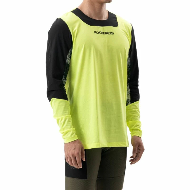 Person wearing a neon green and black long-sleeve shirt with 'ROCKBROS' branding on a white background.