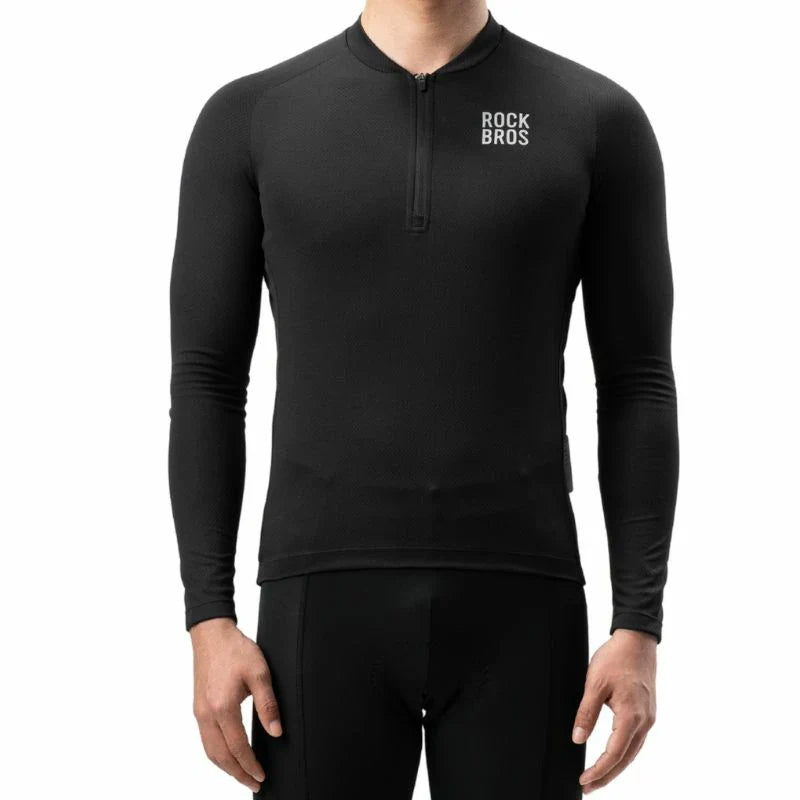 A man wearing a black long-sleeve quarter-zip performance shirt with 'ROCKBROS' printed in white on the left chest, paired with black compression pants, against a solid white background. #Color_Black
