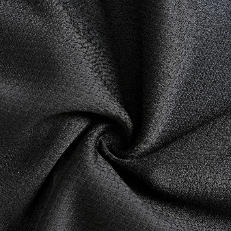Black men’s cycling jersey made with lightweight hexagonal mesh polyester.