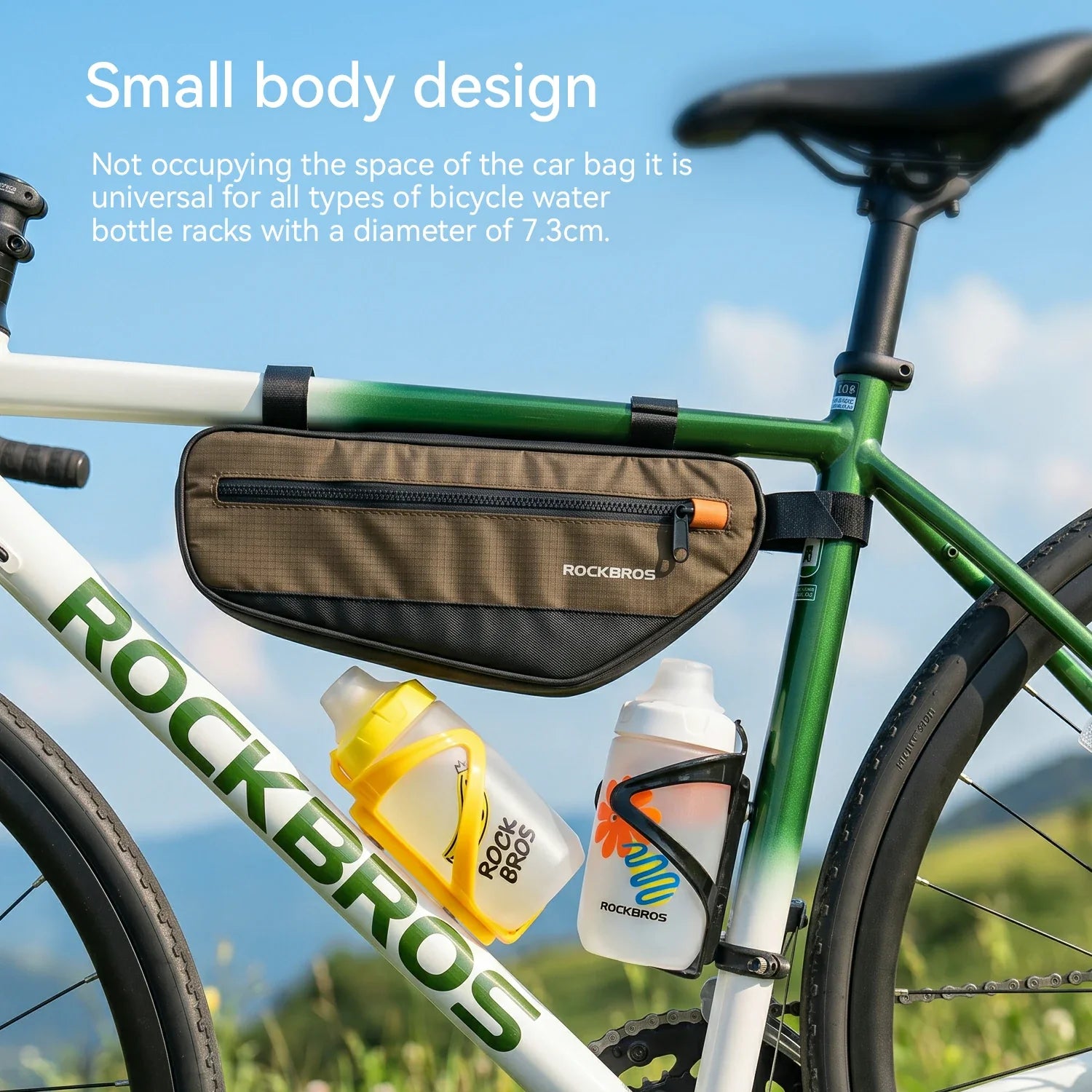 Bicycle with a frame bag and water bottles against a scenic background