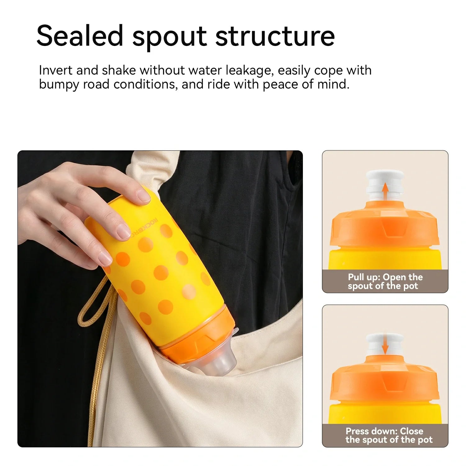 Yellow water bottle with orange accents being held, showing sealed spout structure feature.