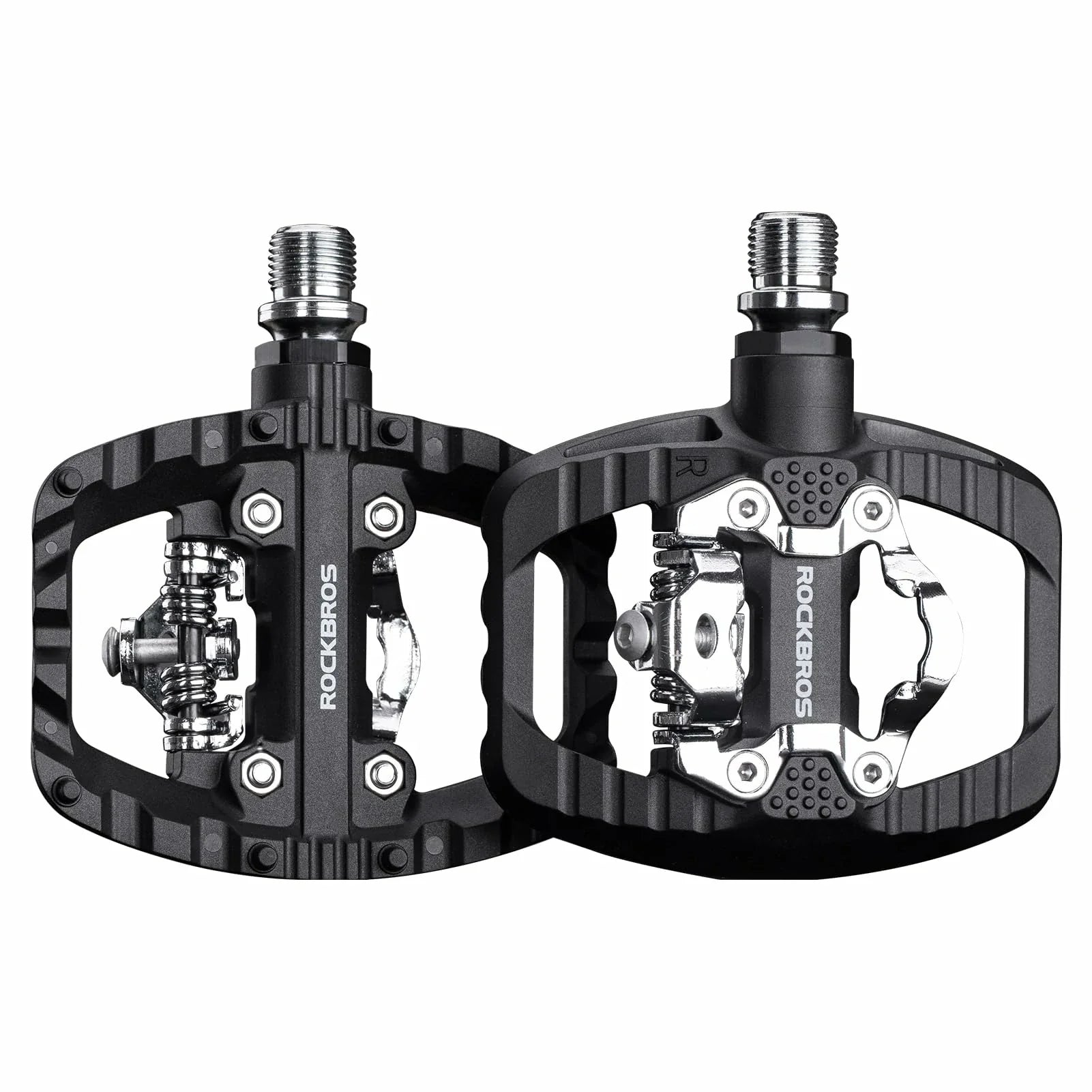 Black bicycle pedals with metallic components on a white background