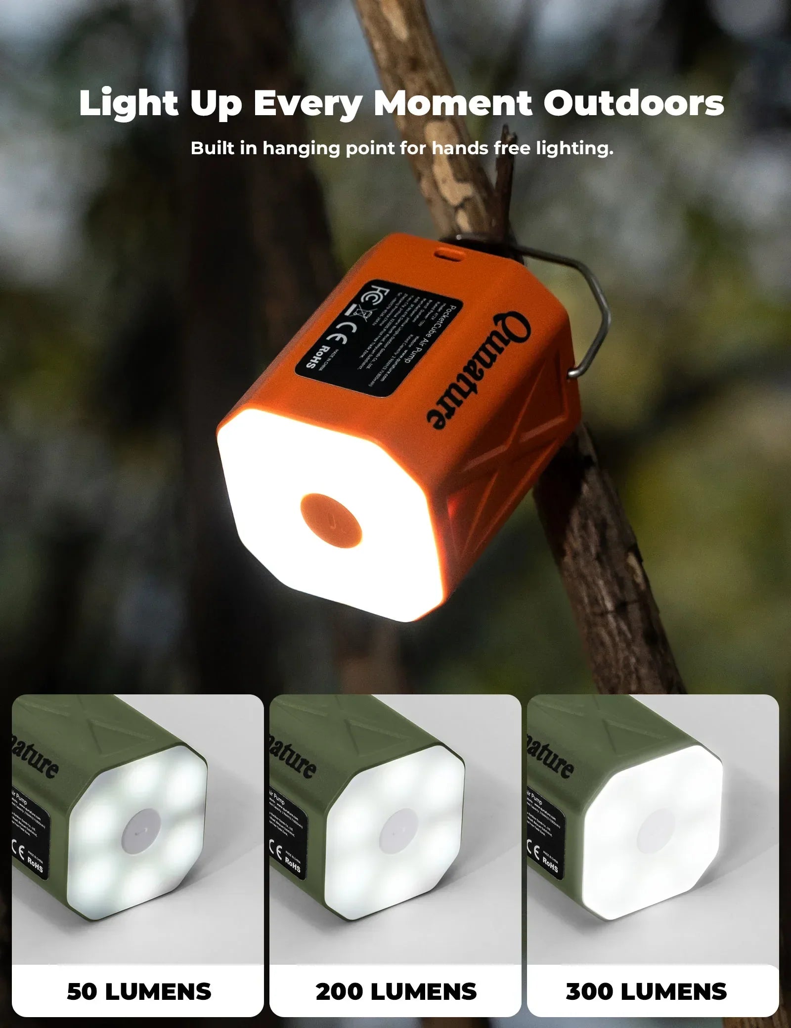 Orange and green portable lights with hanging point on a branch, featuring Lumens rating.