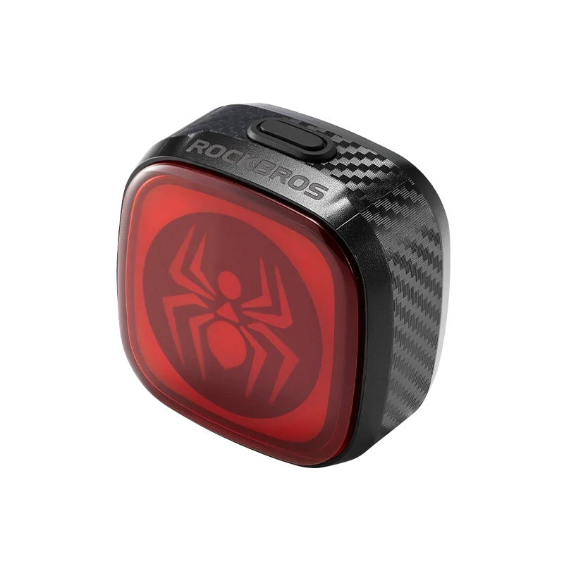 spider icon graphic on a red bicycle tail light #Color_Spider Symbol