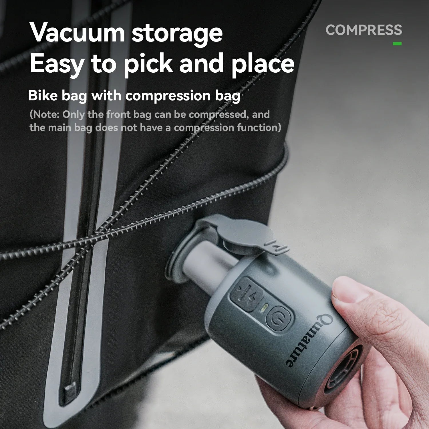 Hand holding a vacuum compression device next to a bike bag with text about vacuum storage.
