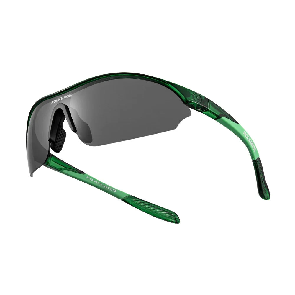 Green sunglasses with dark lenses on a white background #Color_Green