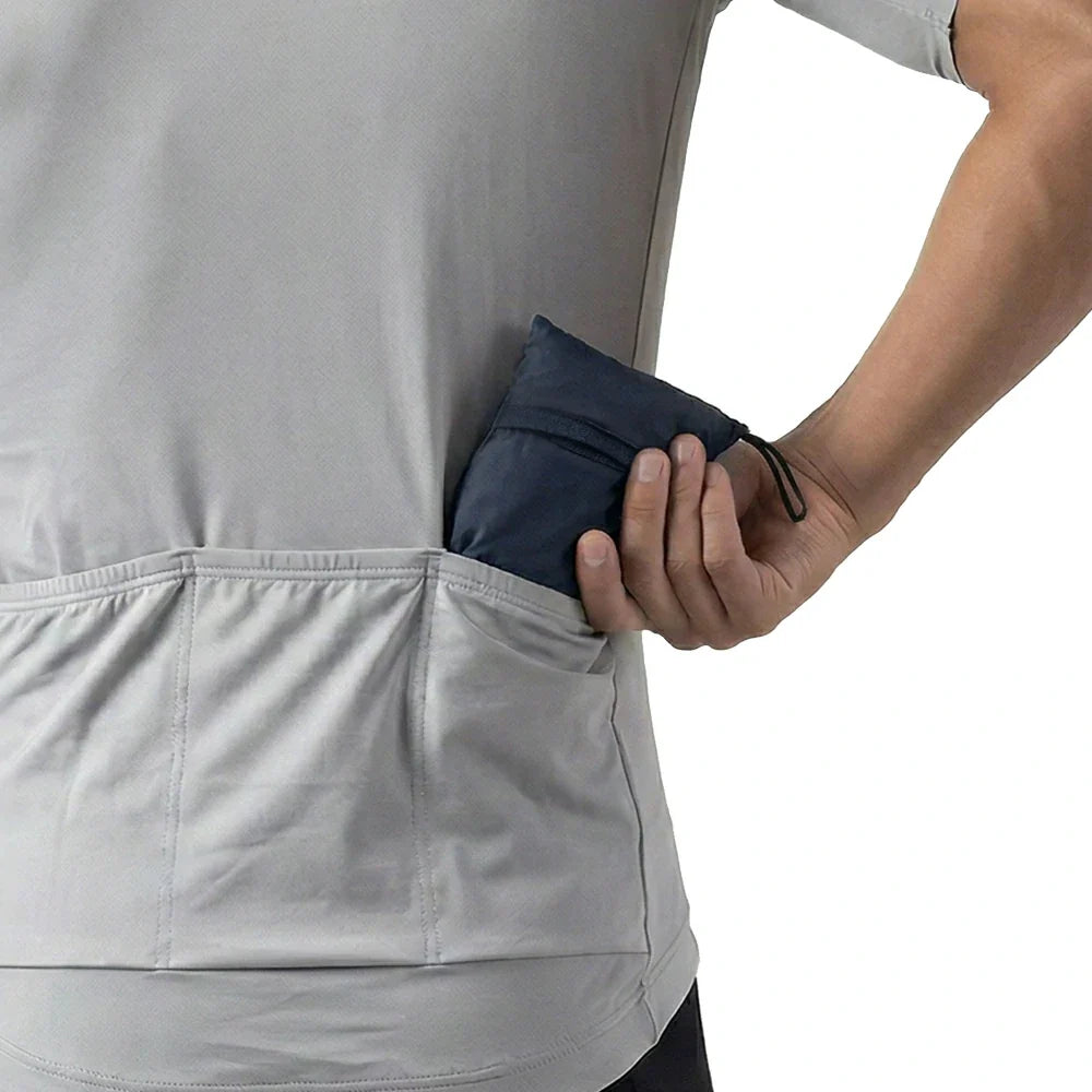 Packable cycling jacket with zoned core heat dissipation.