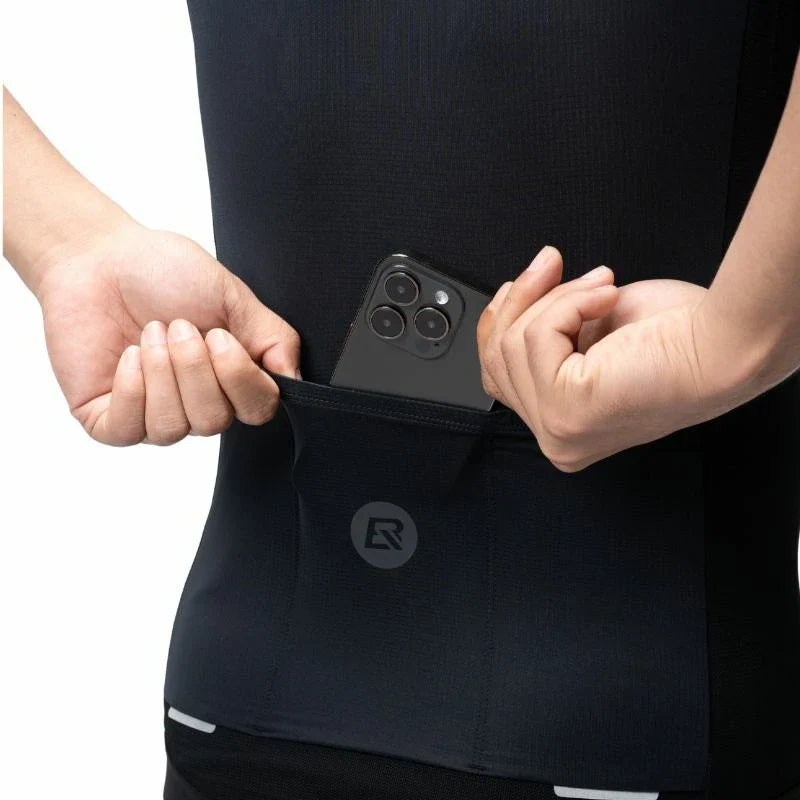 Person wearing a black shirt with a phone case attached to it. #Color_Black