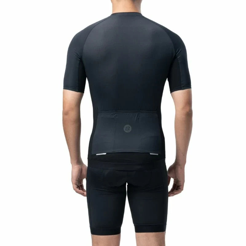Person wearing a black cycling outfit on a white background #Color_Black