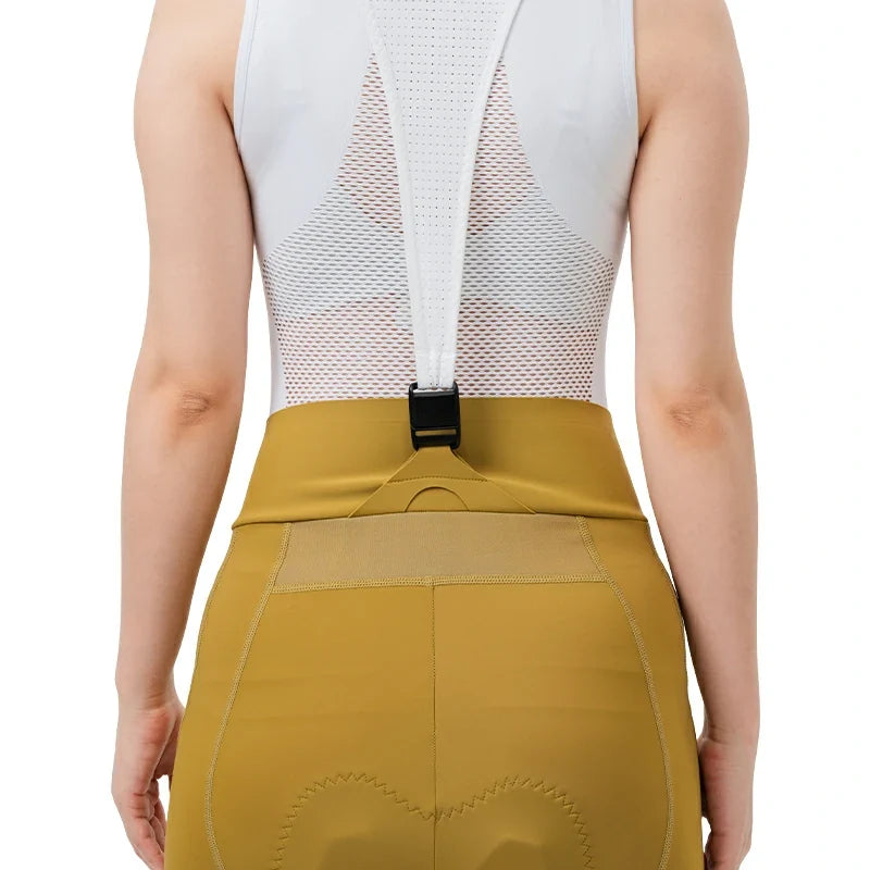 Person wearing a mustard yellow skirt with a white mesh top on a white background #color_Yellow