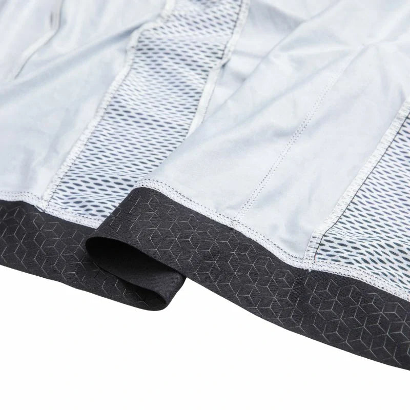 Close-up of a white and gray fabric with textured edges on a white background