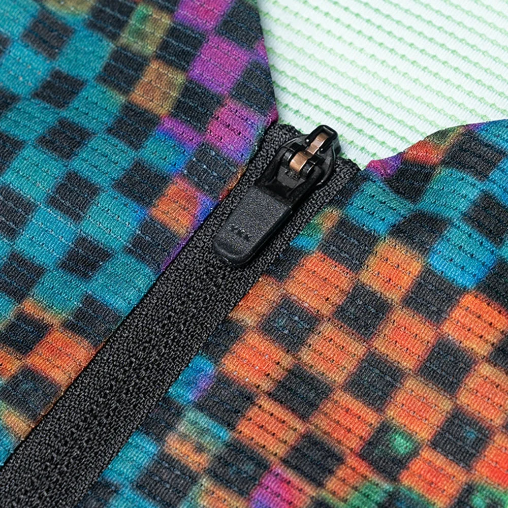 Close-up of a multicolored checkered fabric with a zipper